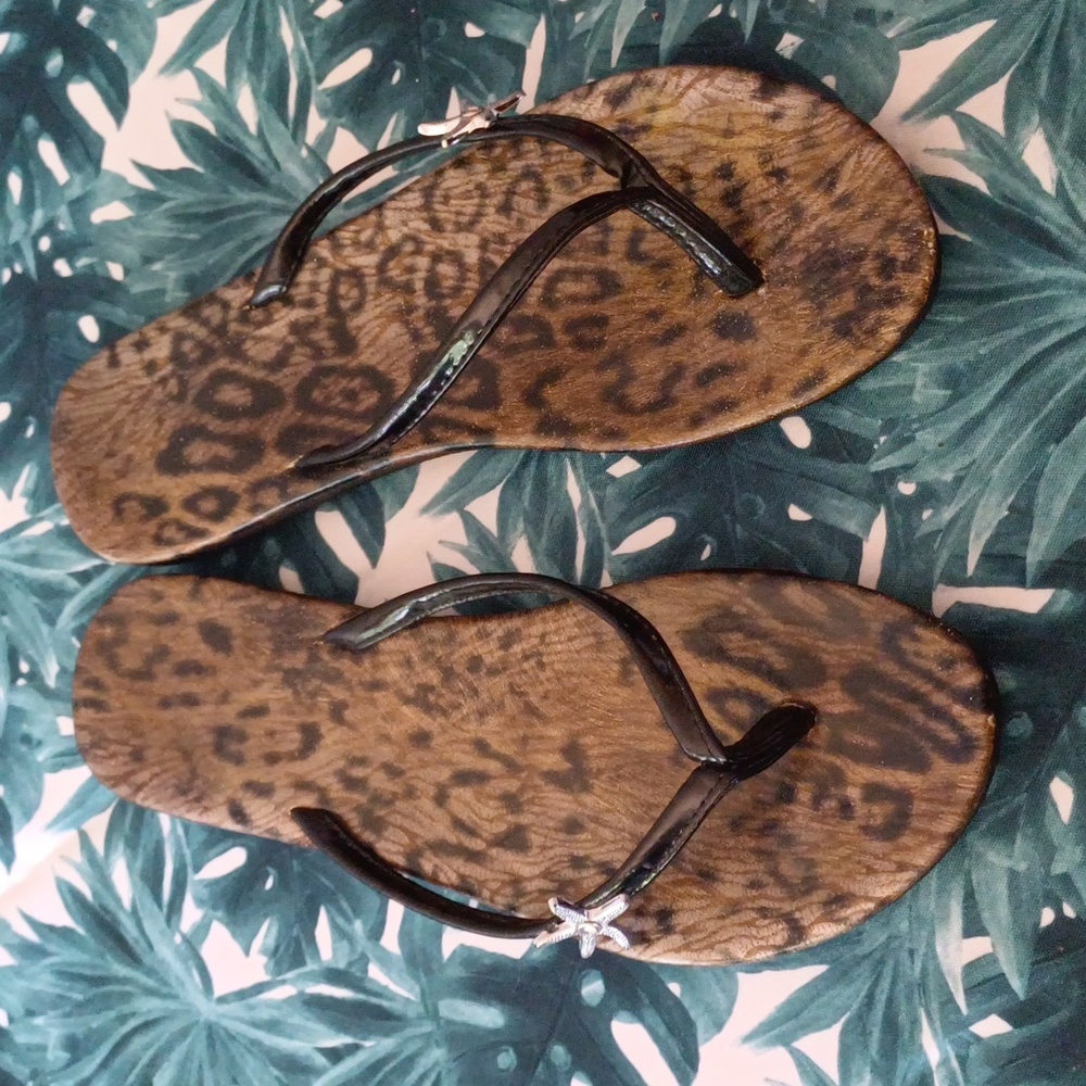 Dressy flip-flops with starfish embellishment.
